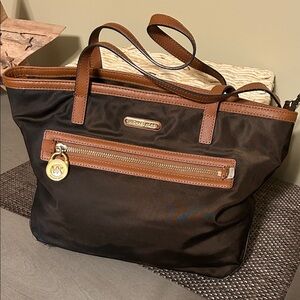 Michael Kors Black and Tan Tote with Gold Charm